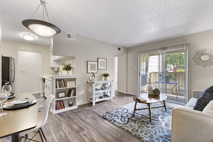 Spacious living room with modern decor at Creekwood Apartments