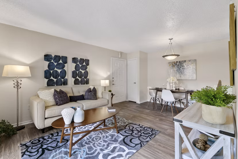 Spacious living room featuring modern decor at Creekwood Apartments, perfect for luxury living