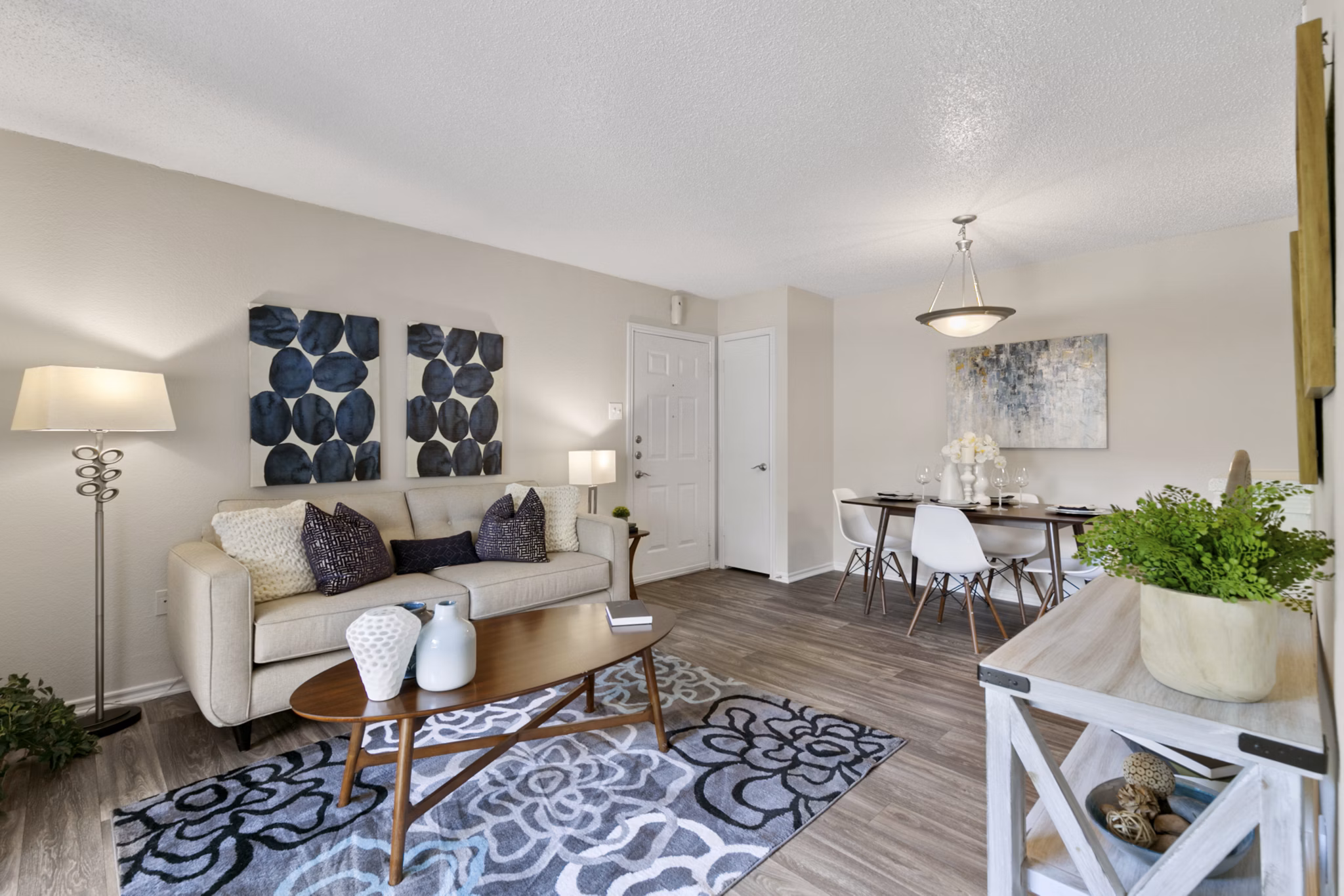 Spacious living room featuring modern decor at Creekwood Apartments, perfect for luxury living
