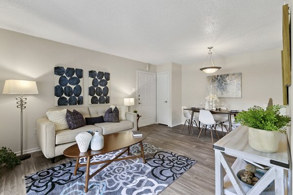 Spacious living room featuring modern decor at Creekwood Apartments, perfect for luxury living