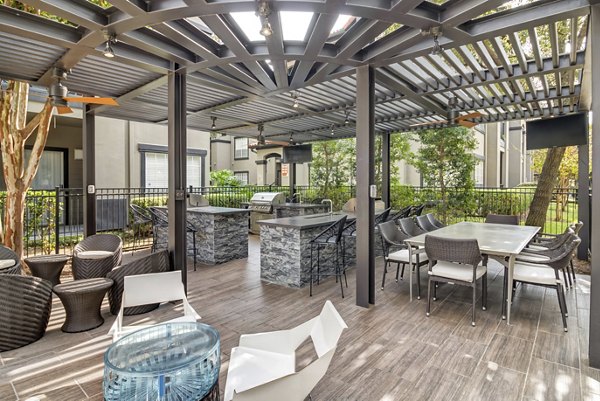 grill area/patio at Villas at River Oaks Apartments
