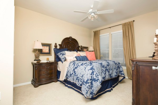 Cozy bedroom with modern furnishings in Broadwater Apartments