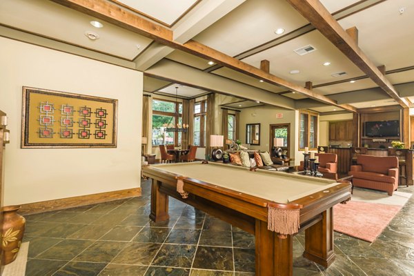 Clubhouse with modern furnishings and natural lighting at Broadwater Apartments, perfect for community gatherings and relaxation