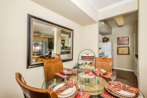 Dining room featuring modern design and sleek furnishings at Broadwater Apartments