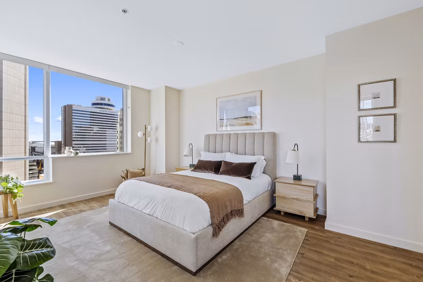 Elegant bedroom with modern decor at 44 Monroe Apartments, offering luxury living in the heart of Phoenix