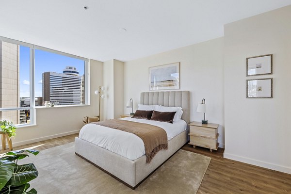 Elegant bedroom with modern decor at 44 Monroe Apartments, offering luxury living in the heart of Phoenix