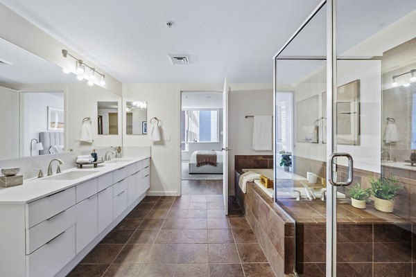 Modern bathroom with stylish fixtures at 44 Monroe Apartments in downtown Phoenix