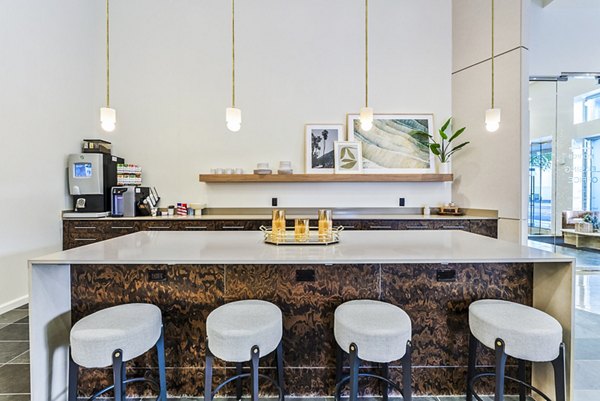 Contemporary lobby with stylish seating at 44 Monroe Apartments clubhouse