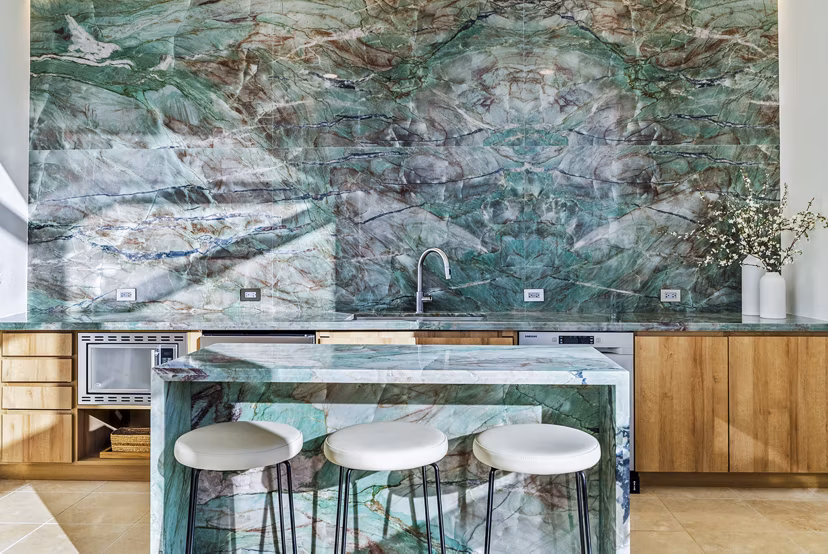 Clubhouse featuring modern lobby design at 44 Monroe Apartments with luxury seating and decor, offering a welcoming community atmosphere