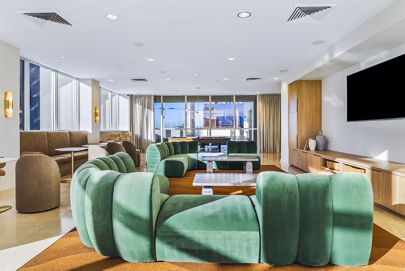 Modern clubhouse with elegant design at 44 Monroe Apartments, offering luxury amenities in a stylish setting