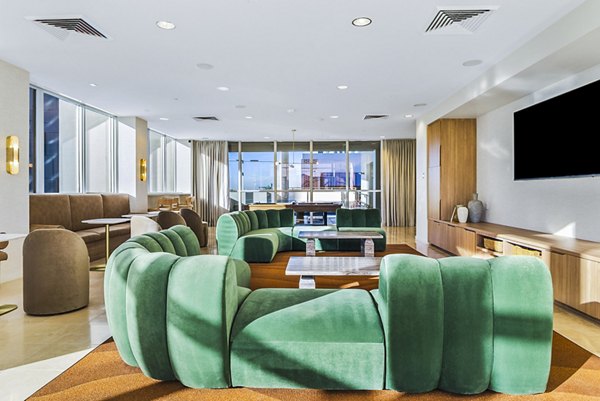Modern clubhouse with elegant design at 44 Monroe Apartments, offering luxury amenities in a stylish setting