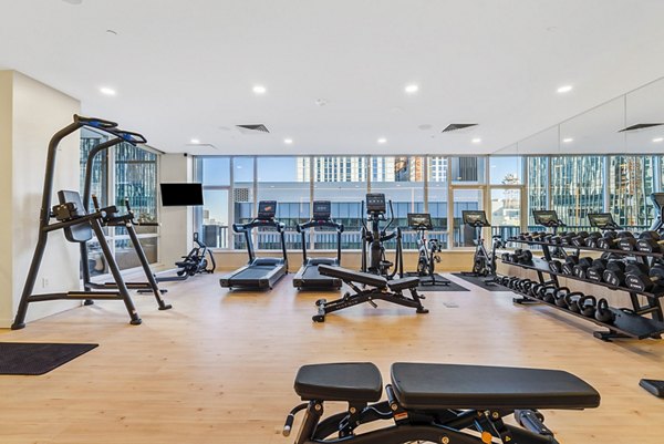 Modern fitness center with state-of-the-art equipment at 44 Monroe Apartments offering convenient onsite exercise facilities