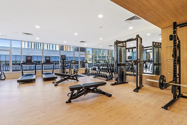 Fitness center with modern equipment at 44 Monroe Apartments