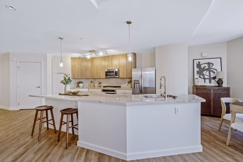 Modern kitchen with stainless steel appliances at 44 Monroe Apartments, luxurious living in downtown Phoenix