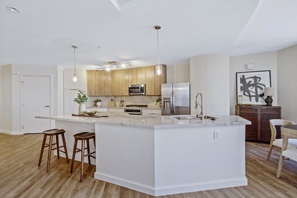 Modern kitchen with stainless steel appliances at 44 Monroe Apartments, luxurious living in downtown Phoenix