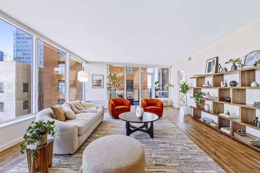 Contemporary living room with sleek furnishings at 44 Monroe Apartments in Greystar luxury collection