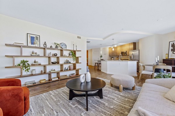 Spacious living room with modern furnishings at 44 Monroe Apartments, a Greystar luxury property in the heart of the city