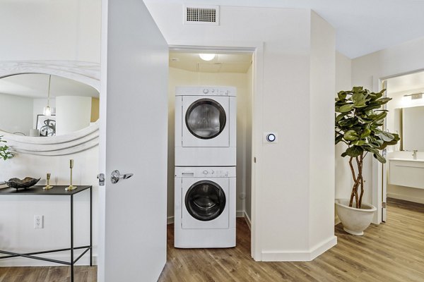 Laundry room featuring modern appliances at 44 Monroe Apartments, a Greystar luxury property in downtown Phoenix