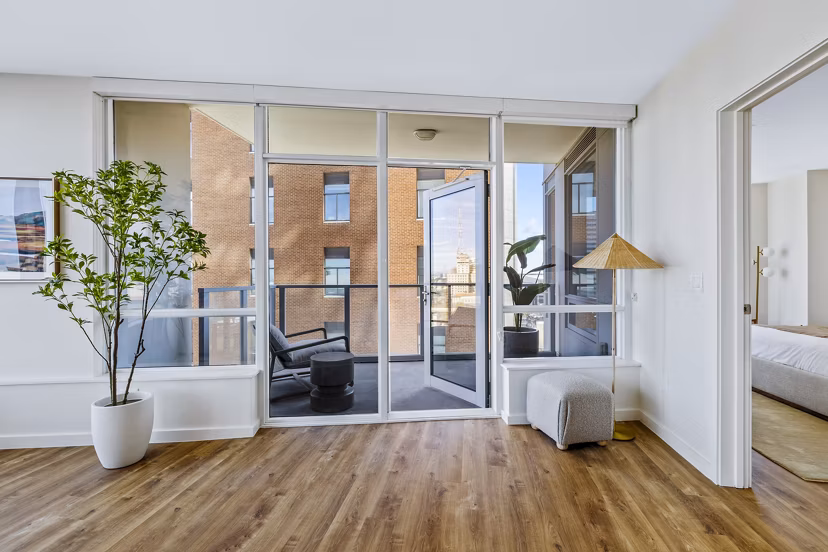 Cozy balcony with modern furnishings at 44 Monroe Apartments