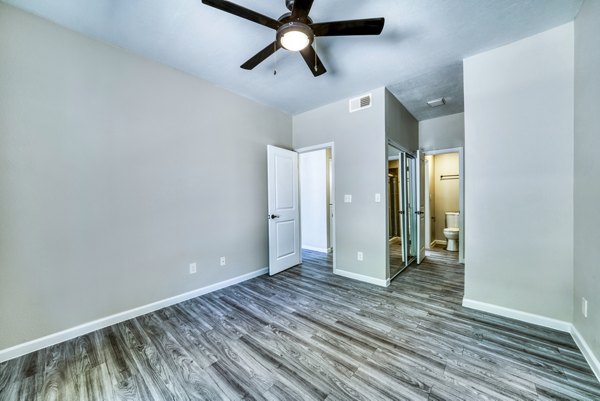 Cozy bedroom with modern dÃ©cor at Hayden Park Apartments, featuring soft lighting and spacious layout