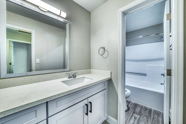 Contemporary bathroom with sleek fixtures at Hayden Park Apartments