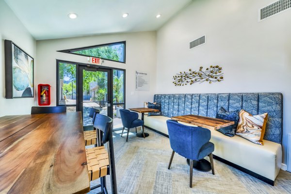 Elegant clubhouse with modern lounge seating at Hayden Park Apartments