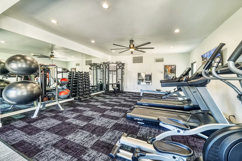 Modern fitness center with state-of-the-art equipment at Hayden Park Apartments