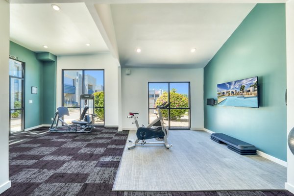 Fitness center with modern equipment at Hayden Park Apartments