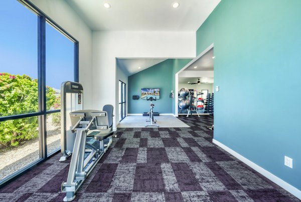Fitness center with modern equipment at Hayden Park Apartments