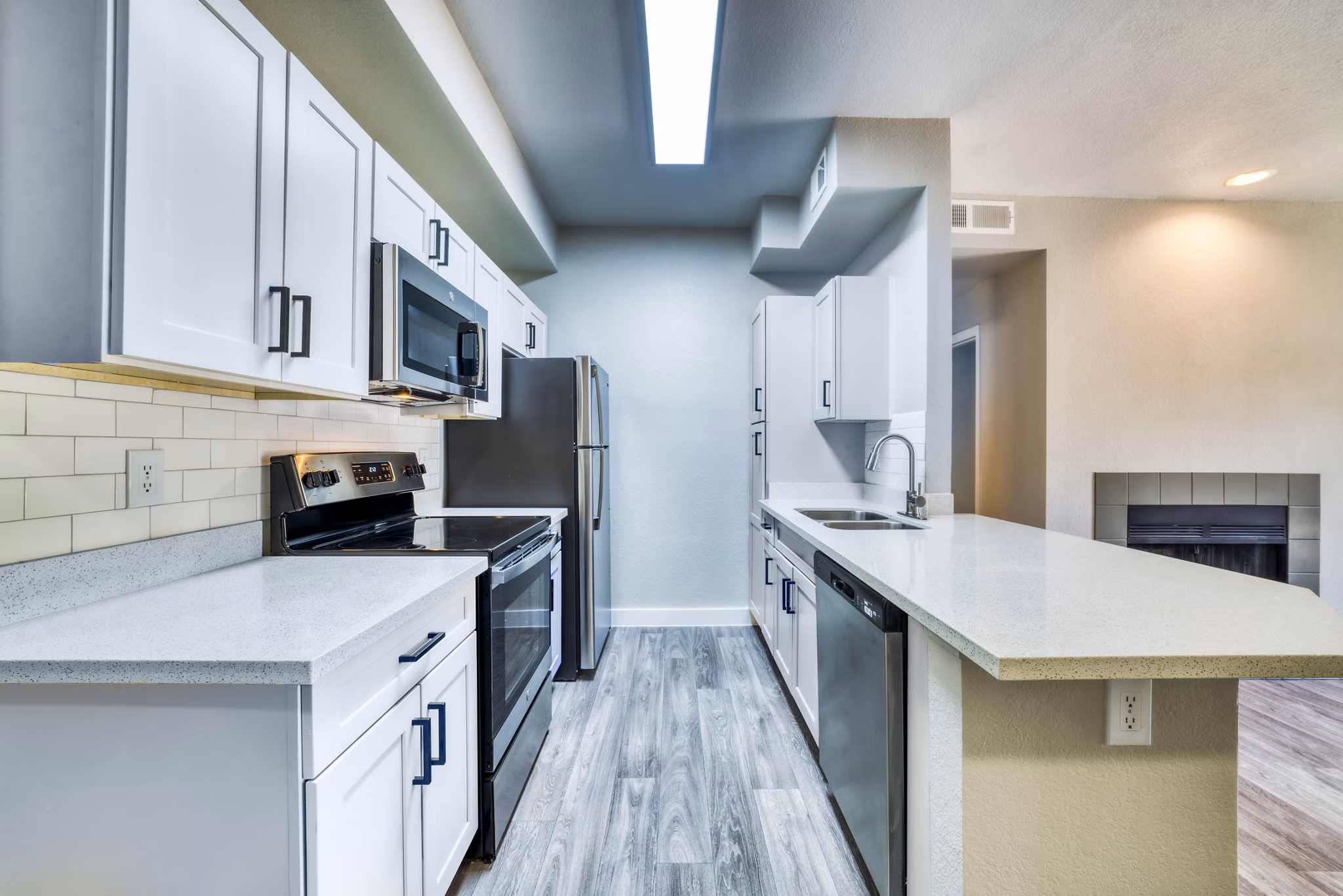 Modern kitchen with stainless steel appliances at Hayden Park Apartments