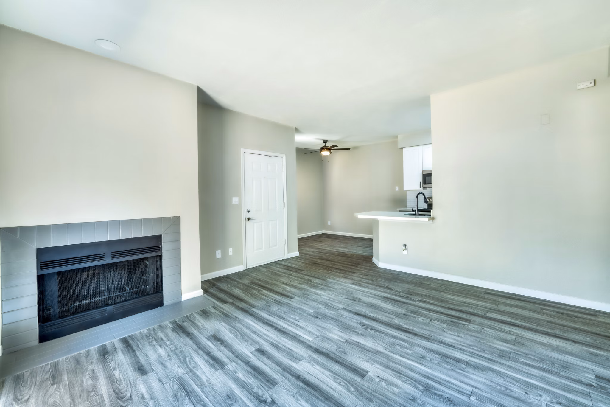 Modern living room with sleek furnishings at Hayden Park Apartments, offering a stylish and comfortable space in luxury Greystar community