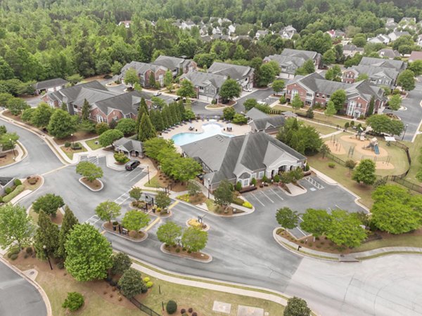 Mandalay Villas: Elegant view of luxury apartments in McDonough, showcasing architectural style and lush landscaping