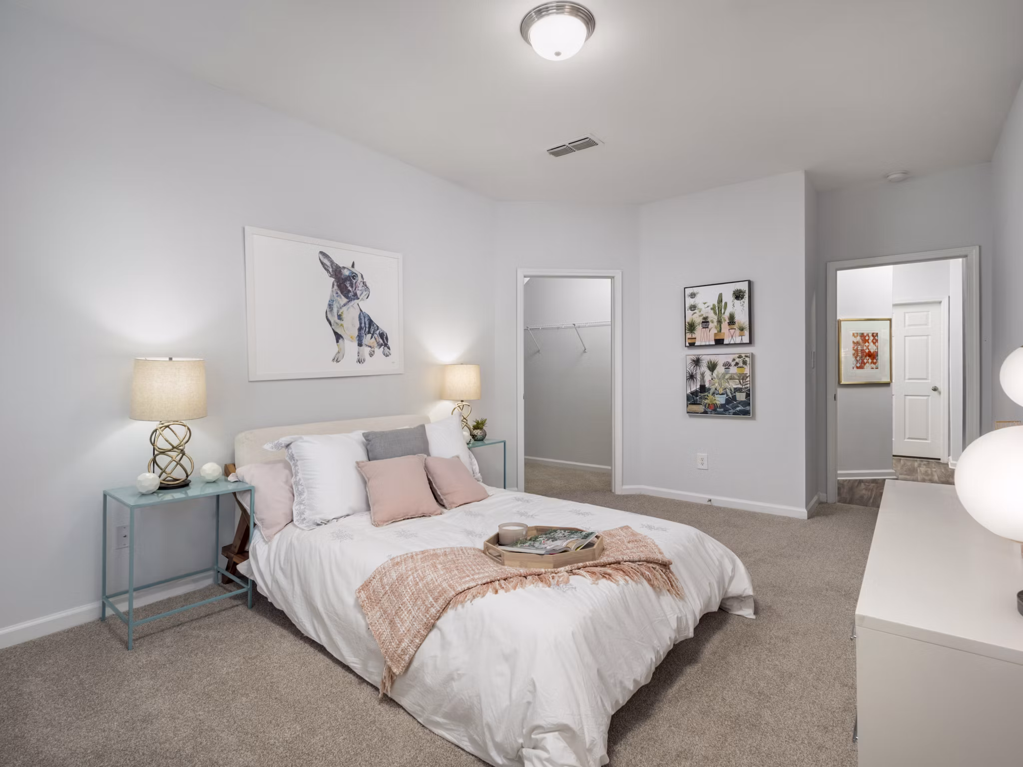 Bedroom featuring elegant decor and plush bedding at Mandalay Villas Apartments