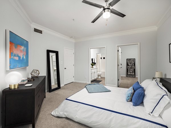 Cozy bedroom with modern decor at Mandalay Villas Apartments