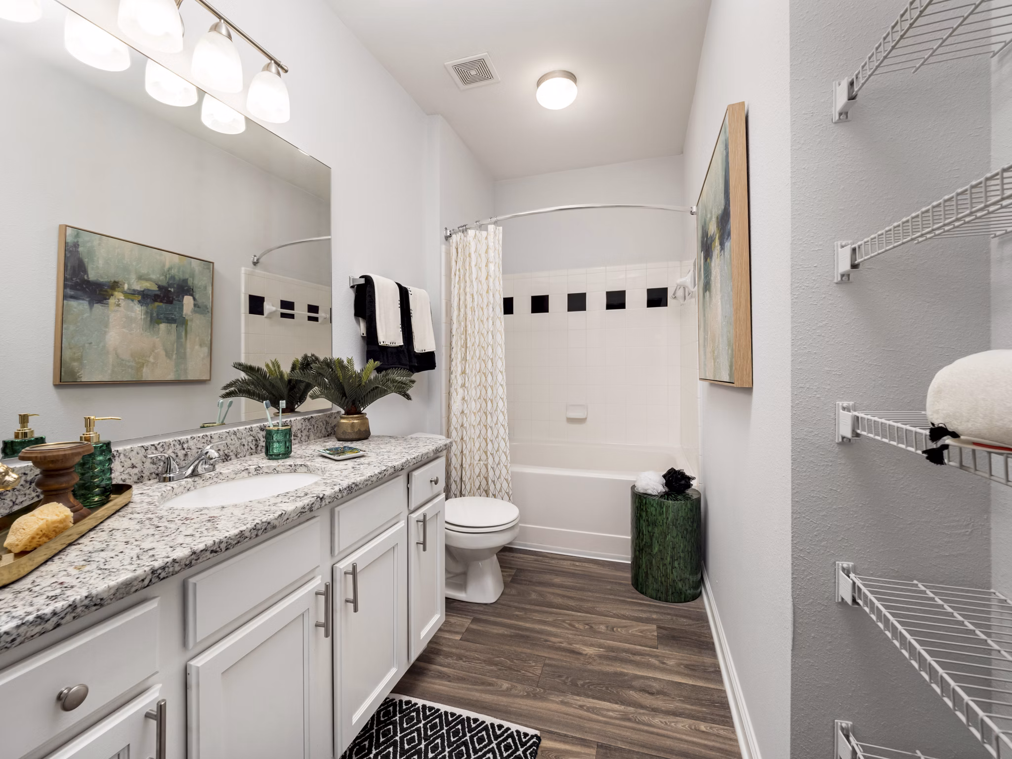 Modern bathroom with sleek fixtures at Mandalay Villas Apartments, offering luxury living and style in a high-end setting
