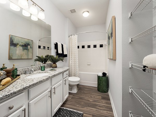 Modern bathroom with sleek fixtures at Mandalay Villas Apartments, offering luxury living and style in a high-end setting