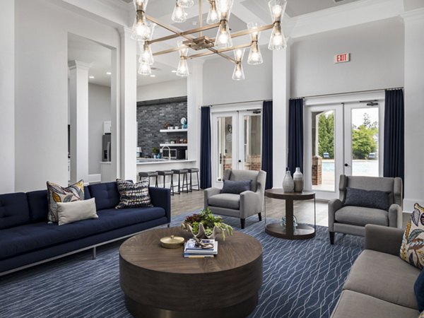 Elegant clubhouse featuring modern decor at Mandalay Villas Apartments, offering a luxury lifestyle in a vibrant community