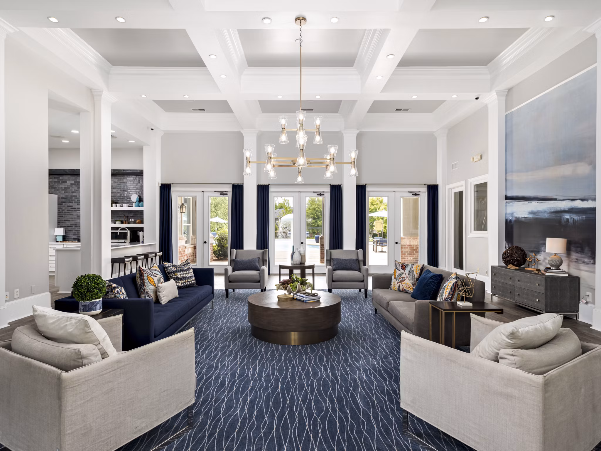 Clubhouse with modern design and ample seating at Mandalay Villas Apartments