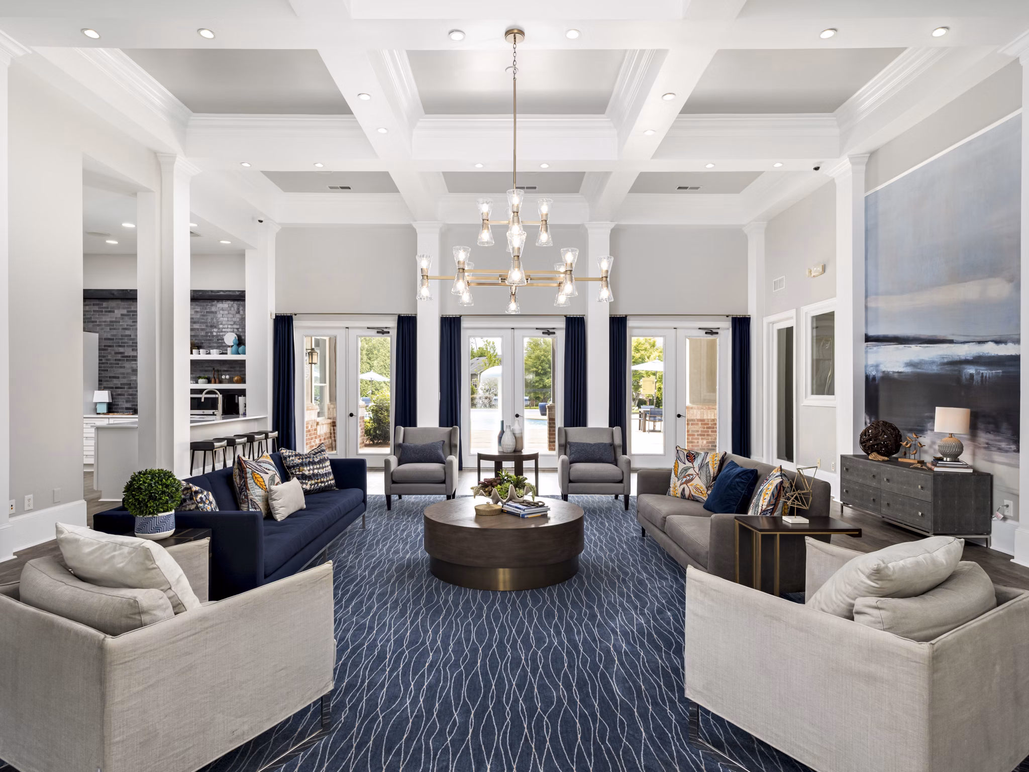 Clubhouse with modern design and ample seating at Mandalay Villas Apartments