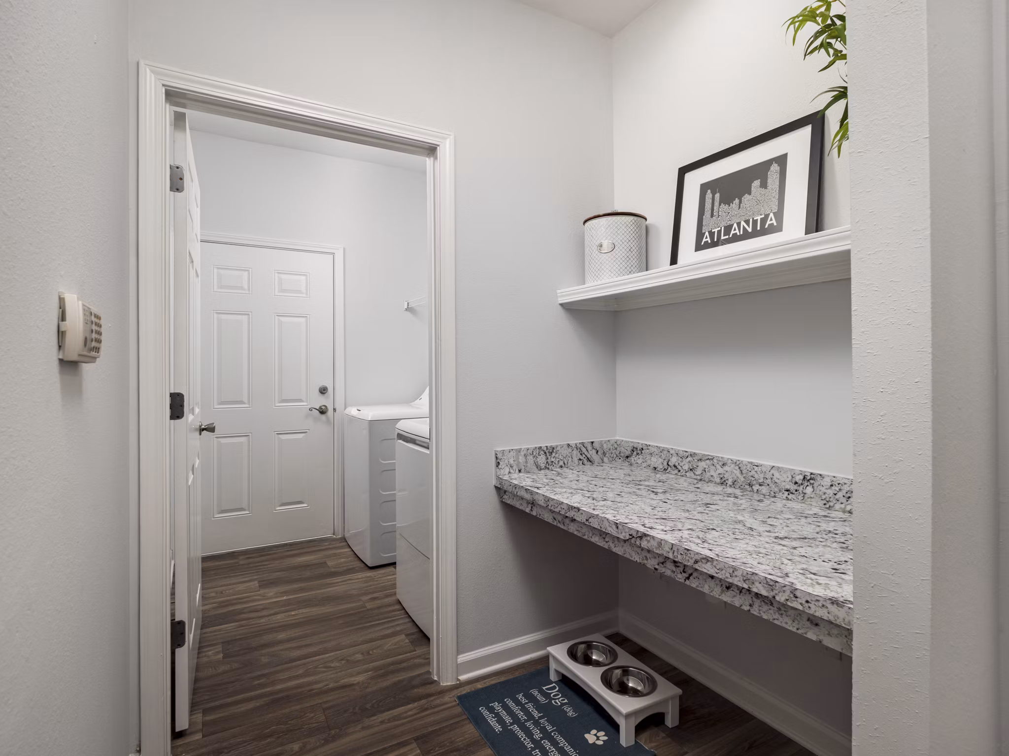 Laundry room with advanced appliances at Mandalay Villas Apartments