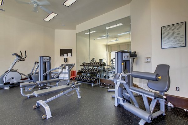 fitness center at The Pointe at New Town Apartments