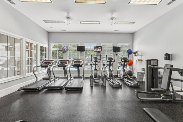 fitness center at The Pointe at New Town Apartments