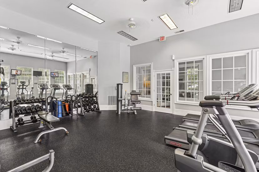 fitness center at The Pointe at New Town Apartments