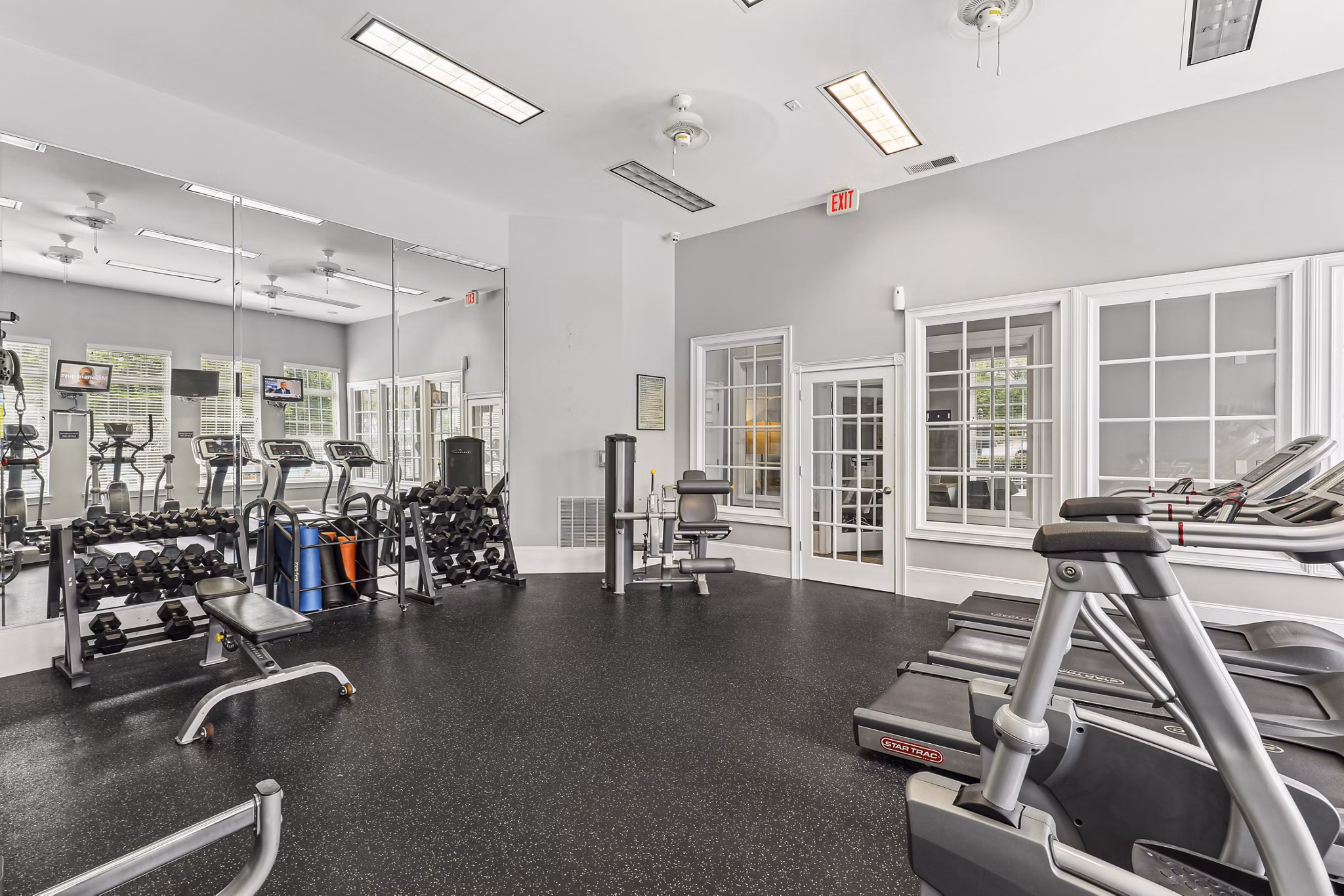fitness center at The Pointe at New Town Apartments