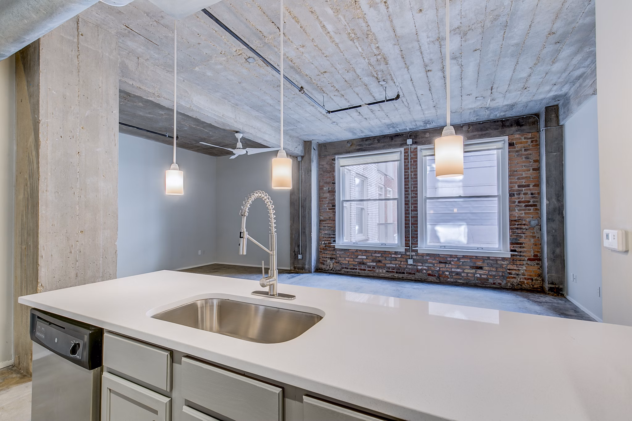 Modern kitchen with stainless steel appliances at Interurban Building Apartments, a luxury residence by Greystar