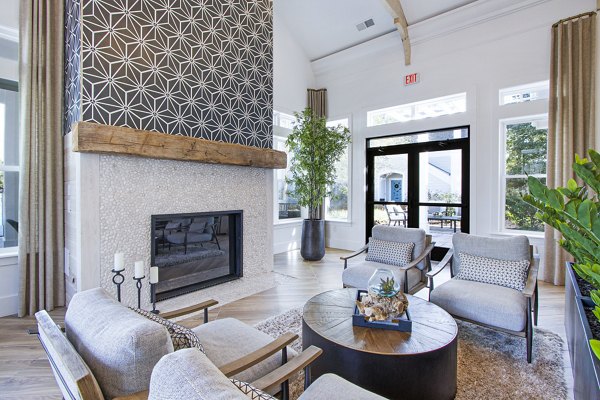 Elegant clubhouse lobby with modern seating at 1000 West Apartments