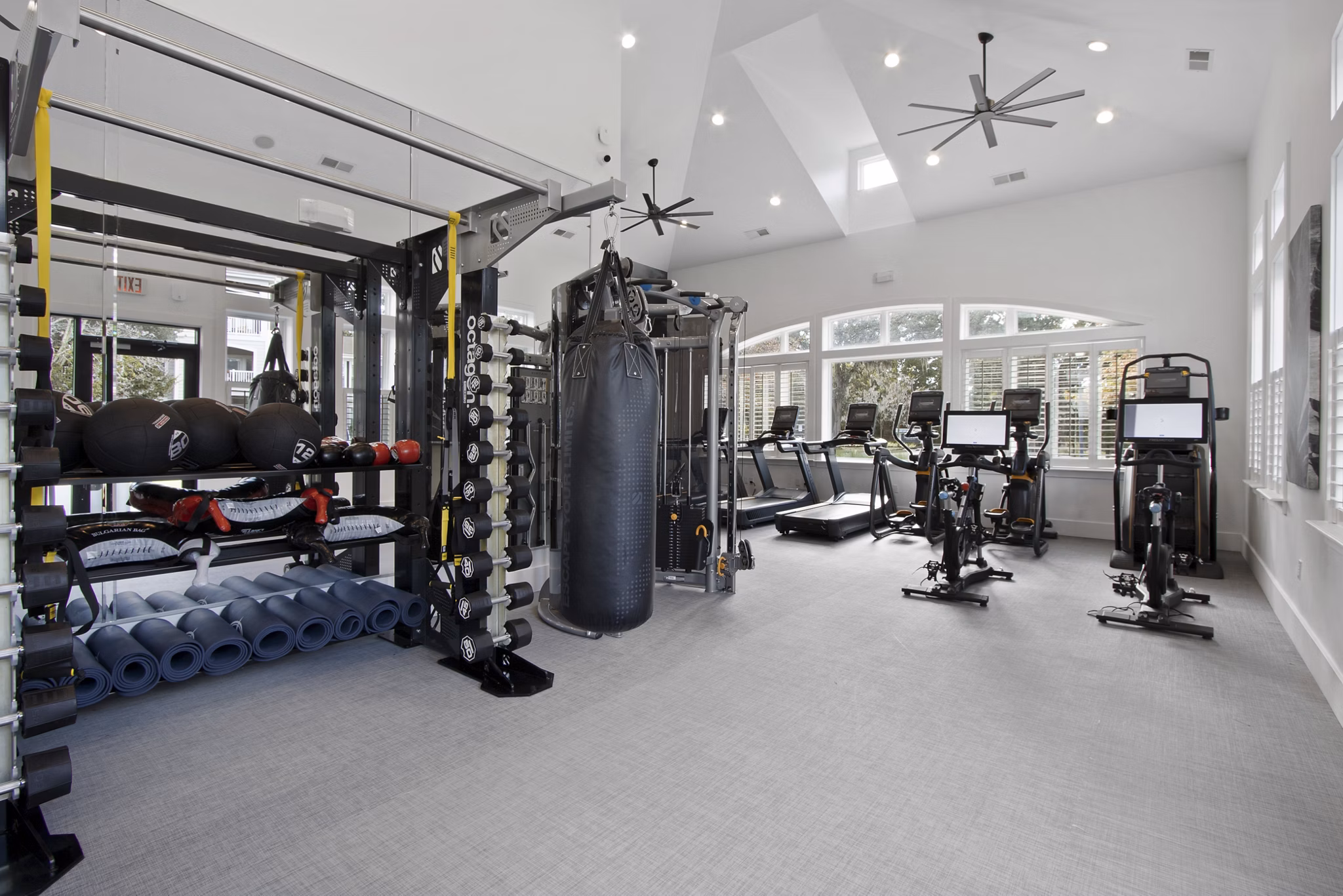State-of-the-art fitness center with modern equipment at 1000 West Apartments in downtown luxury community