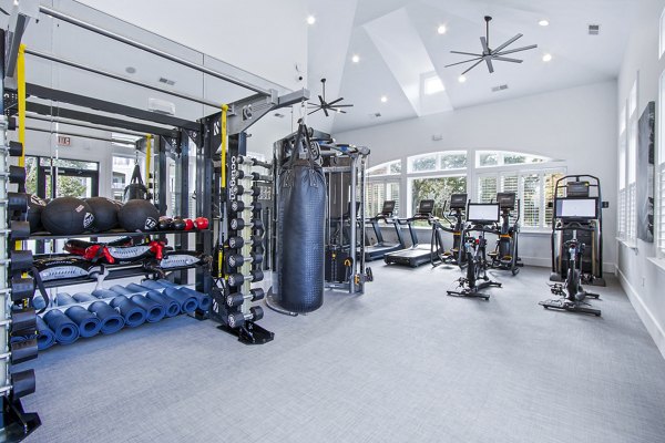 State-of-the-art fitness center with modern equipment at 1000 West Apartments in downtown luxury community
