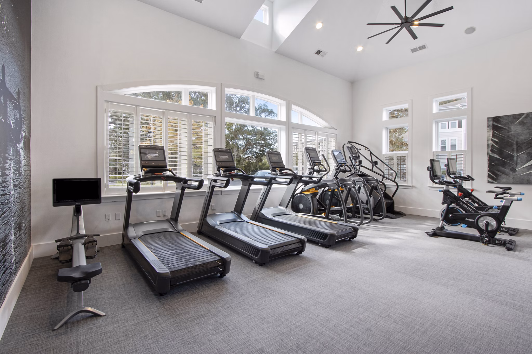 State-of-the-art fitness center with modern equipment at 1000 West Apartments offering luxury living options in prime urban location