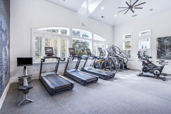 State-of-the-art fitness center with modern equipment at 1000 West Apartments offering luxury living options in prime urban location